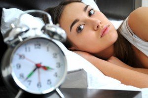 20819507 - clock with sleep at night  woman can not sleep